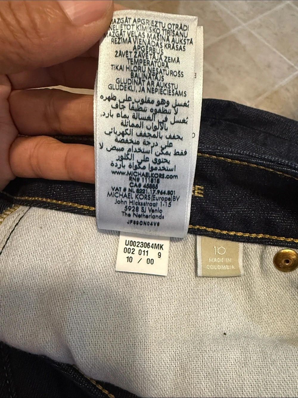 Michael Kors Dark Blue High-Rise Flare Jeans with Multi-Button Front
